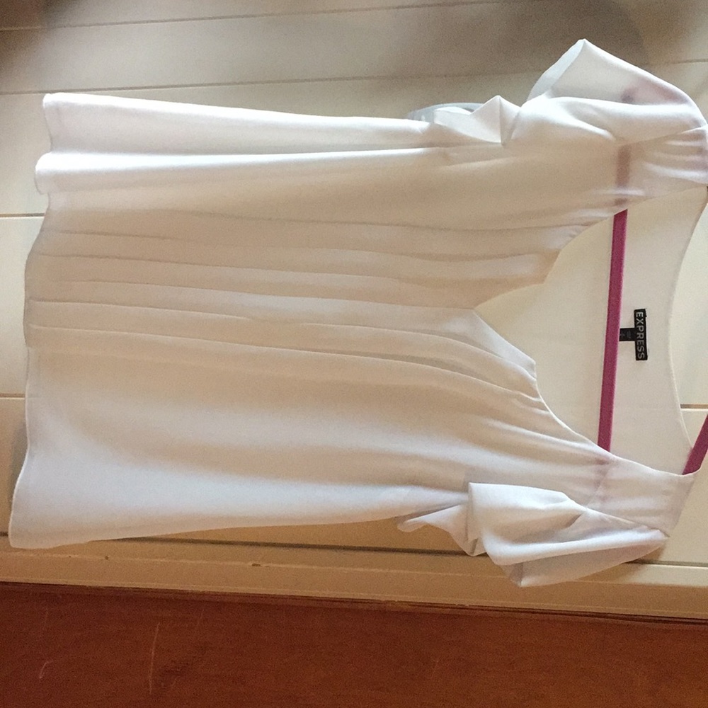 White pleated blouse